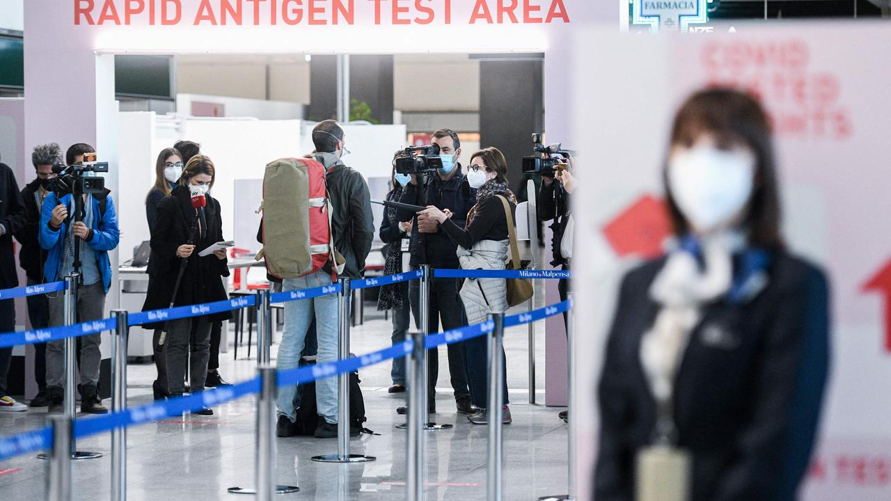 Passengers undertake rapid antigen swab tests at Malpensa Airport in Milan, Italy which has seen a surge in cases of the infectious UK strain. Picture: Piero Cruciatti/AFP