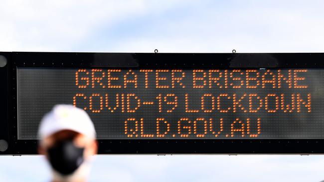 An electronic sign advises Brisbane is in lockdown. Picture: Dan Peled