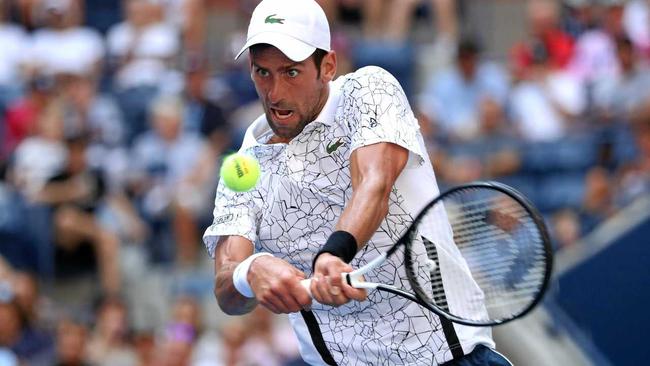 Serbia's Novak Djokovic fires a return at Portugal's Jaoa Sousa in their round-of-16 clash at the US Open. Picture: Matthew Stockman/Getty