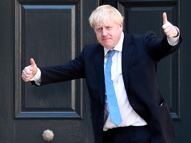 LONDON, ENGLAND - JULY 23: Newly elected Conservative party leader Boris Johnson poses outside the Conservative Leadership Headquarters on July 23, 2019 in London, England. After a month of hustings, campaigning and televised debates the members of the UK's Conservative and Unionist Party have voted for Boris Johnson to be their new leader and the country's next Prime Minister, replacing Theresa May. (Photo by Dan Kitwood/Getty Images) ***BESTPIX***