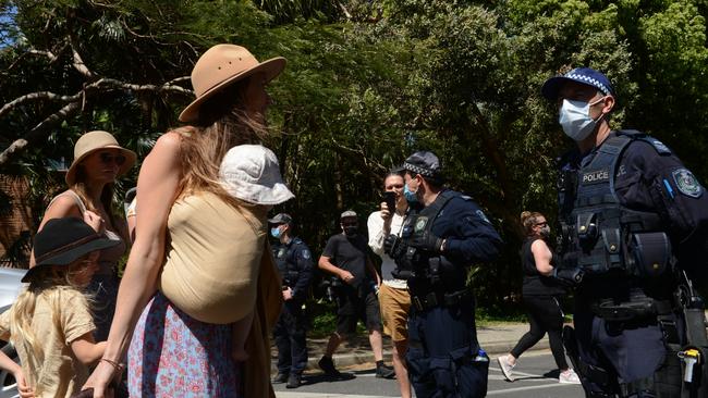 A woman confronts police during a protest in Byron Bay on September 18. Picture: Liana Boss