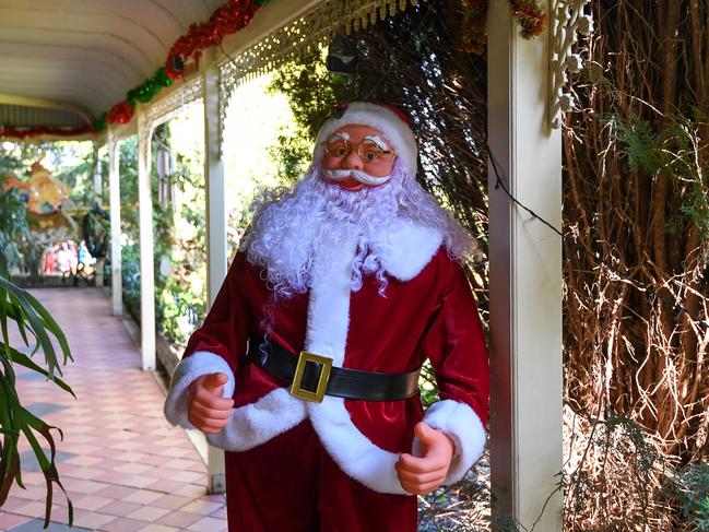 Life-sized Santas are among Will Eastmure’s decorations.