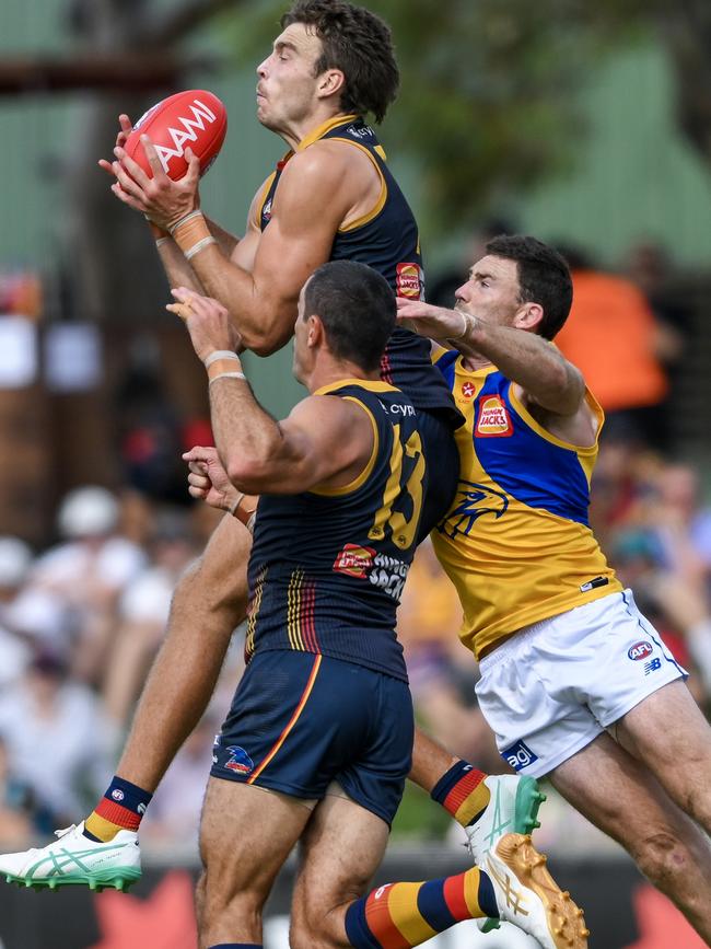 Crow Riley Thilthorpe takes a strong mark before being injured in the AFL Community Series match against the Eagles. Picture: Mark Brake/Getty Images