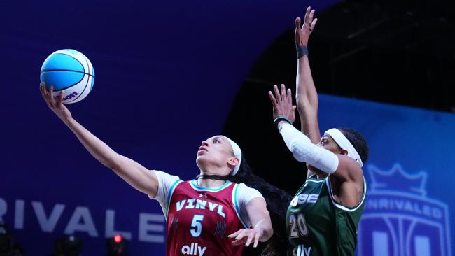 Dearica Hamby of the Vinyl goes up for a shot against Brittney Sykes of Rose during an Unrivaled game in Florida on Tuesday. Picture: Rich Storry/Getty Images