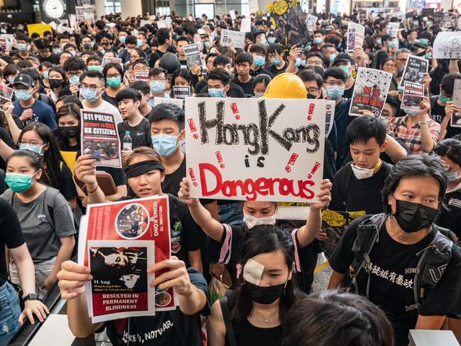 Protesters occupy the arrival hall of the Hong Kong International Airport. Picture: Anthony Kwan/Getty Images