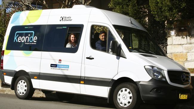 Alex Terno of Marsfield and Driver Jay Balasubramanian on the Keoride Bus. Similar buses from a different company will be rolled out on demand in Newcastle. Picture: John Appleyard