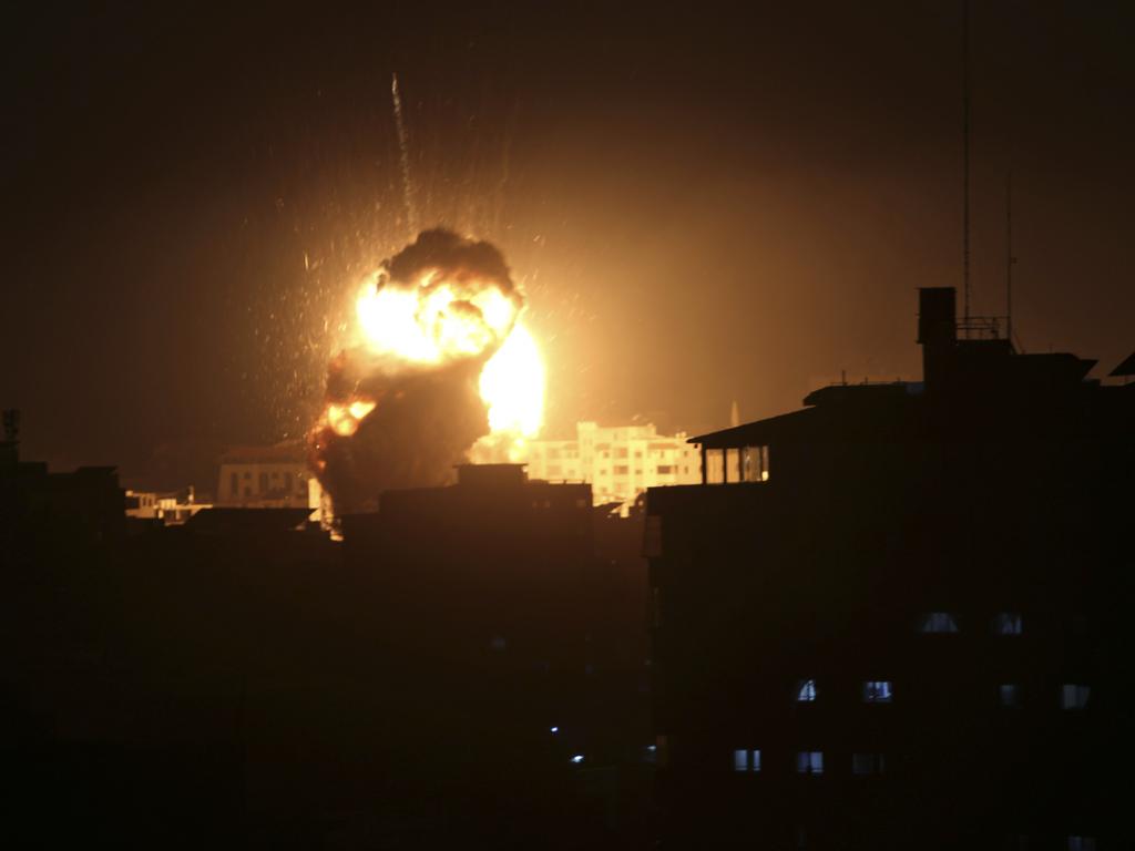 An explosion caused by Israeli air strikes is seen from the offices of Hamas leader Ismail Haniyeh, in Gaza City. Picture: AP