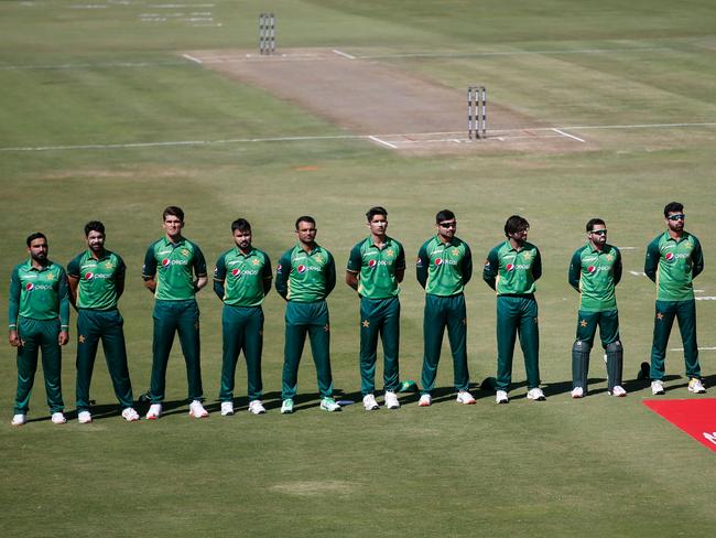 The Pakistan team sing the national anthem ahead of the first one-day international.