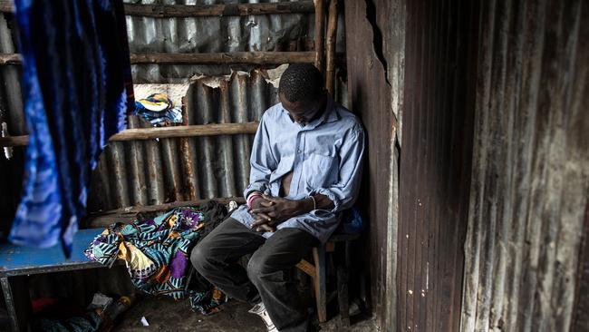 A man sleeps inside a drug den at the Kington landfill site in Freetown on June 21, 2023. Picture: John Wessels / AFP