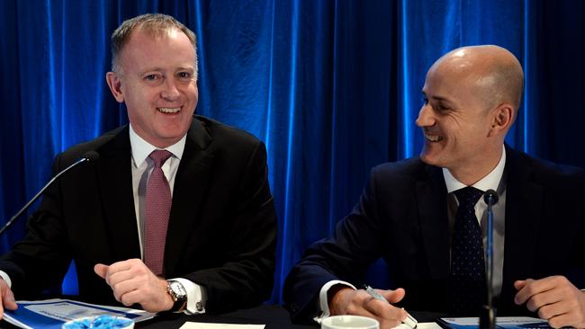 Outgoing QBE CEO John Neal (left) and his successor Patrick Regan (right).