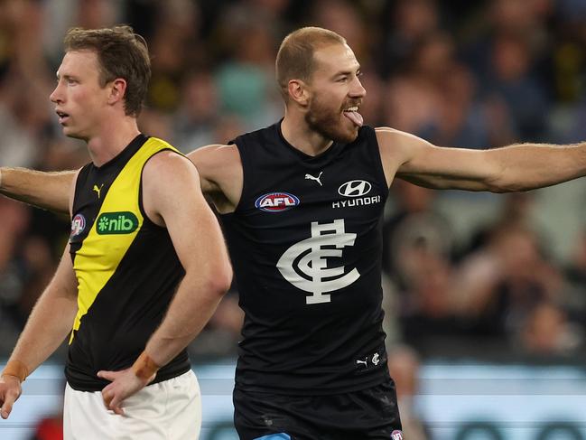 MELBOURNE, AUSTRALIA - MARCH 14: Harry McKay of the Blues celebrates after scoring a goal during the round one AFL match between Carlton Blues and Richmond Tigers at the Melbourne Cricket Ground, on March 14, 2024, in Melbourne, Australia. (Photo by Robert Cianflone/Getty Images)