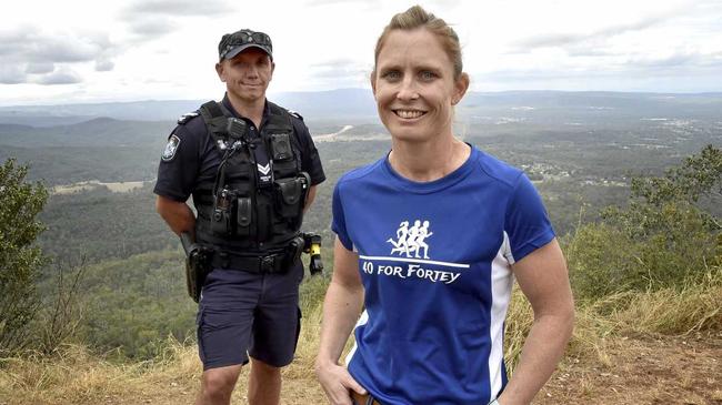 READY TO RUN: Police officers Senior Constable Louise MacDonald (front) and Senior Constable Geordie Horn prepare for 40 for Fortey. Picture: Bev Lacey