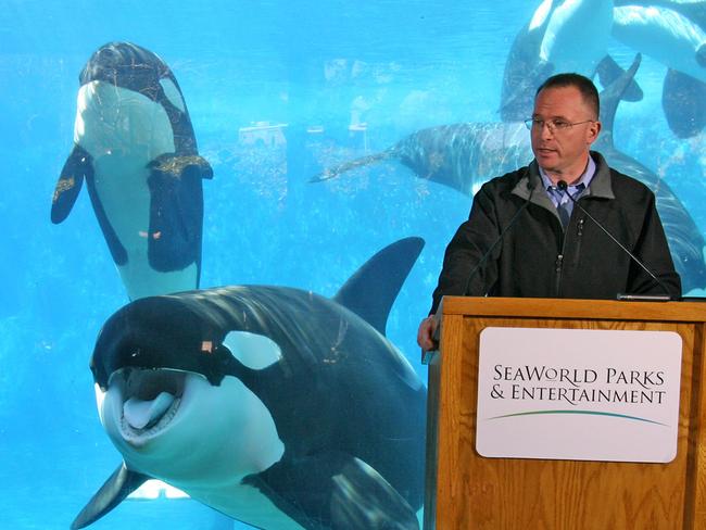 Resigned ... Jim Atchison, right, former President and CEO of SeaWorld Parks &amp; Entertainment in 2010. Picture: AP