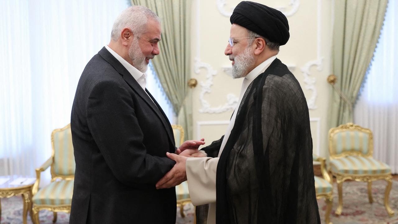 Ismail Haniyeh (left) pulled Hamas’ strings from the Iranian capital Tehran. (Photo by Iranian Presidency / AFP)