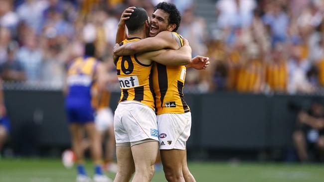 Cyril Rioli and Paul Puopolo celebrate Hawthorn’s 2015 premiership. Picture: Wayne Ludbey