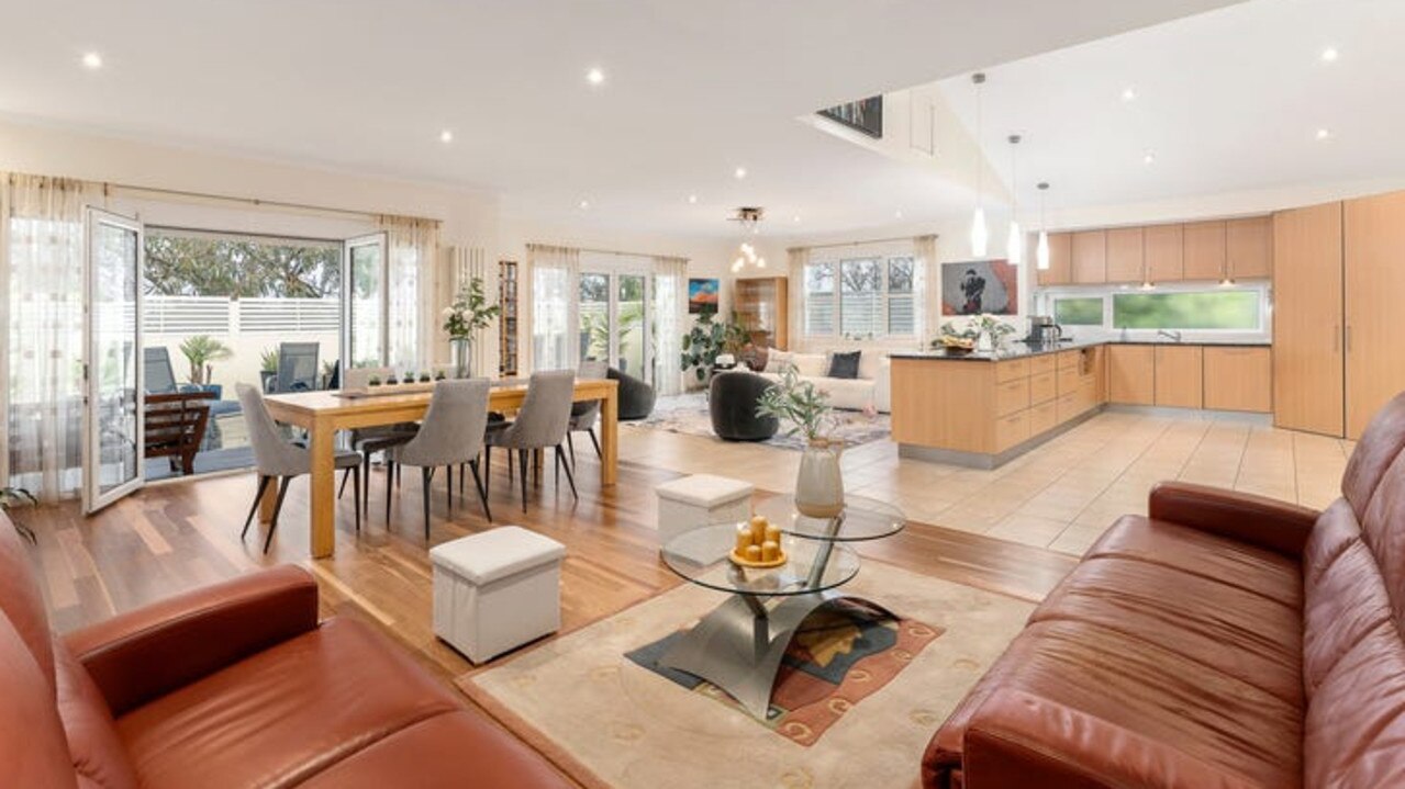 The outdoor entertainment deck can be accessed from the open-plan dining and family room.