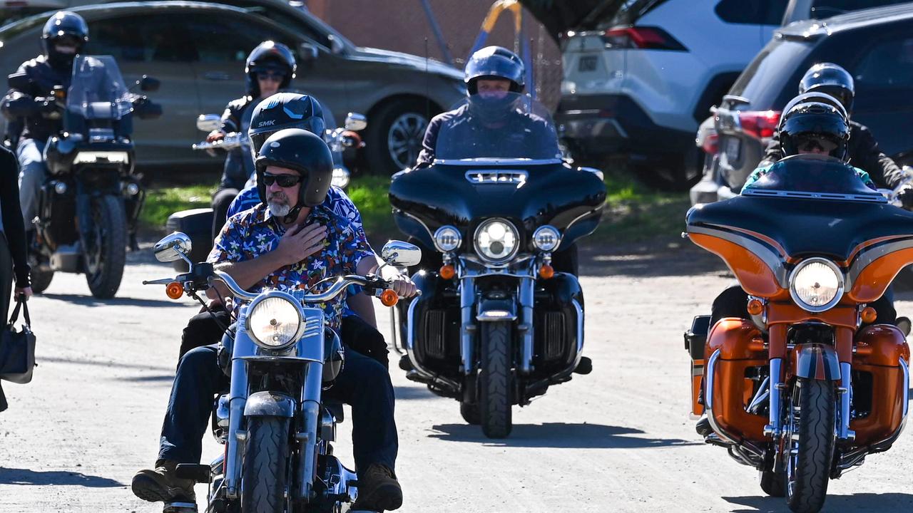 His father Sal Loiacono holds his hand across his heart arriving at wake at the Hope Valley Football Club oval. Picture: NCA NewsWire / Naomi Jellicoe