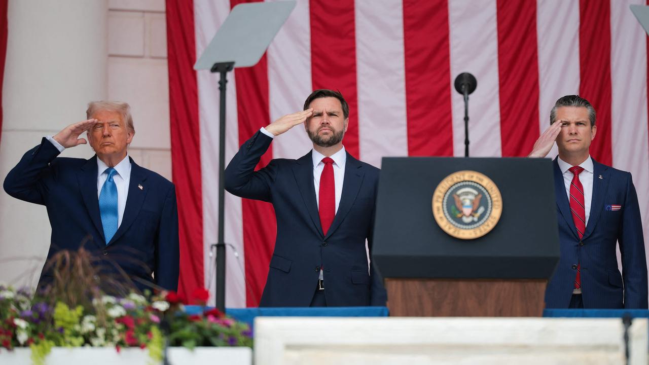 (L-R) U.S. President Donald Trump, U.S. Vice President JD Vance, and U.S. Secretary of Defense Pete Hegseth greet visitors during the Memorial Day wreath-laying ceremony at the Memorial Amphitheatre in Arlington National Cemetery. Picture: Getty Images via AFP