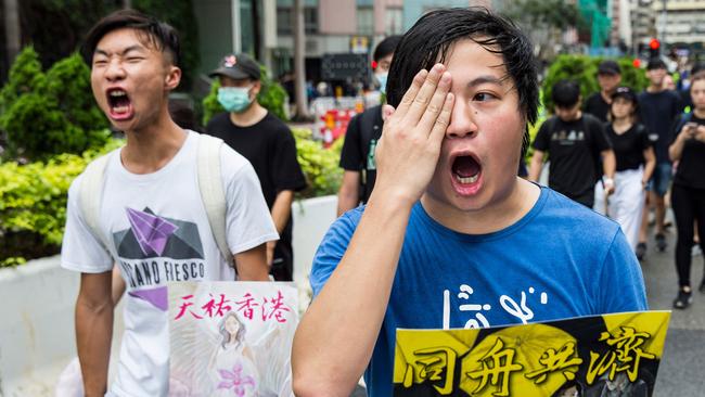 Anti-government protesters attend a rally in the Hung Hom district of Hong Kong.