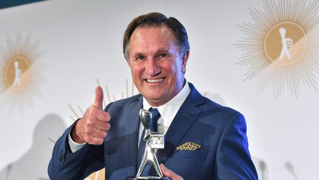 Frankie J. Holden poses for a photograph with the Logie for the most outstanding supporting actor. Picture: AAP