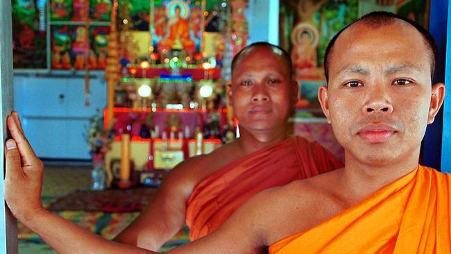 Monks photographed during more peaceful times at the temple.