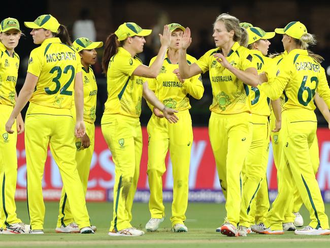 GQEBERHA, SOUTH AFRICA - FEBRUARY 18: Australia celebrates the dismissal of Laura Wolvaardt of South Africa during the ICC Women's T20 World Cup match between South Africa and Australia at St George's Park on February 18, 2023 in Gqeberha, South Africa. (Photo by Richard Huggard/Gallo Images/Getty Images)