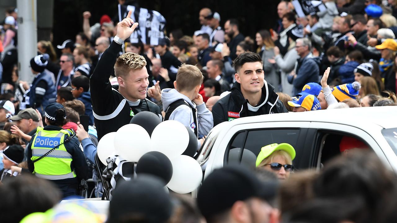 Magpies Jordan de Goey and Brayden Maynard in the 2018 grand final parade. Picture: AAP Image/Julian Smith