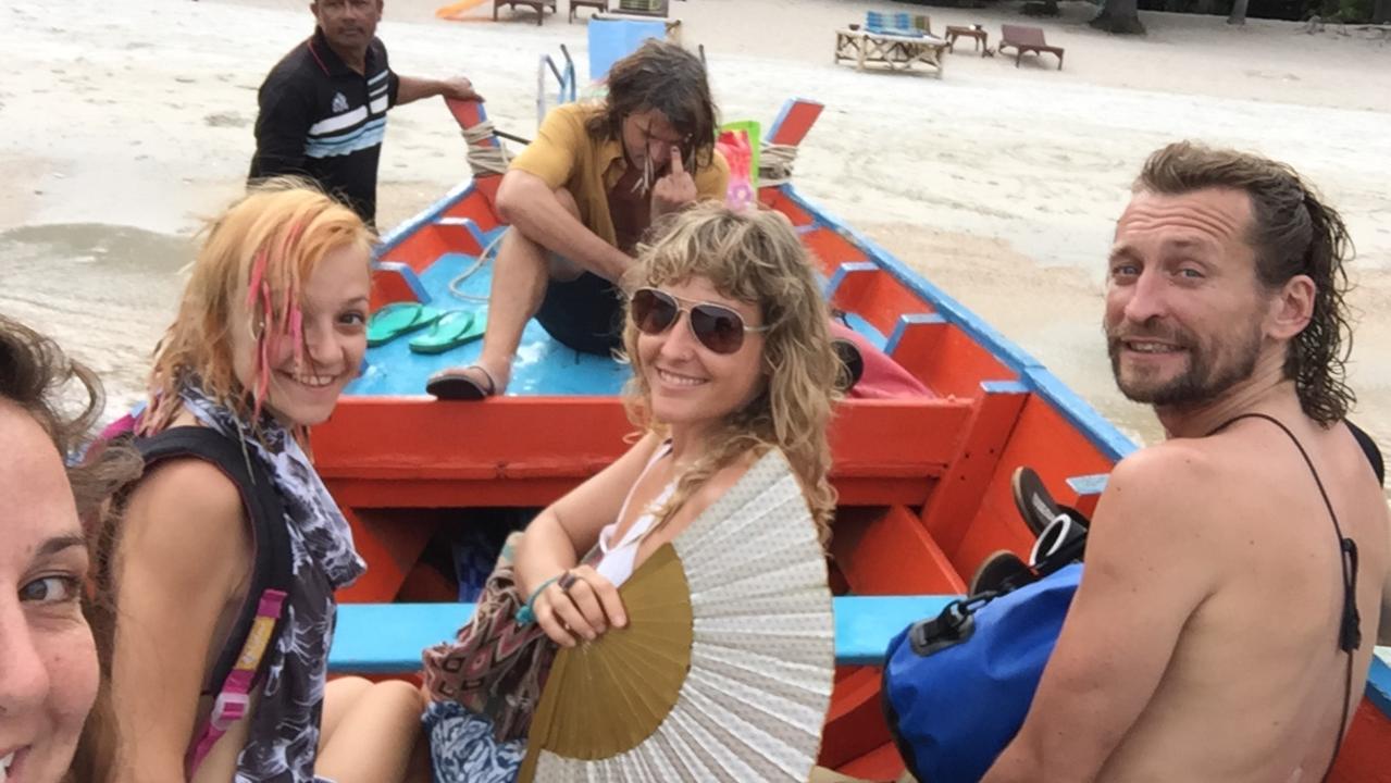 Complete strangers led Rebecca Andrews (far right) to an actual secret beach in Thailand. Picture: Rebecca Andrews