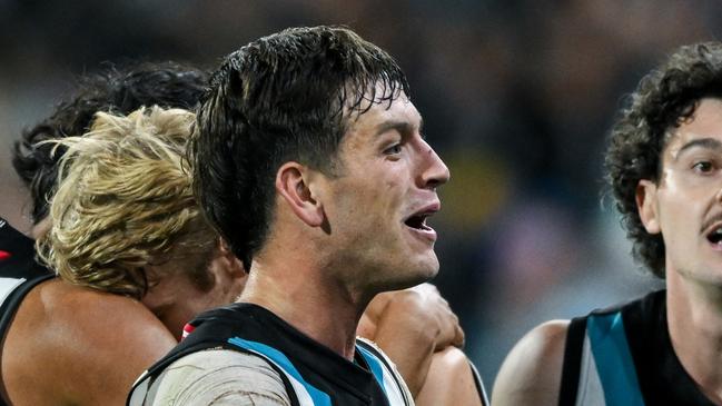 ADELAIDE, AUSTRALIA - APRIL 13:  Zak Butters of the Power  celebrates the final siren during the round five AFL match between Port Adelaide Power and Fremantle Dockers at Adelaide Oval, on April 13, 2024, in Adelaide, Australia. (Photo by Mark Brake/Getty Images)