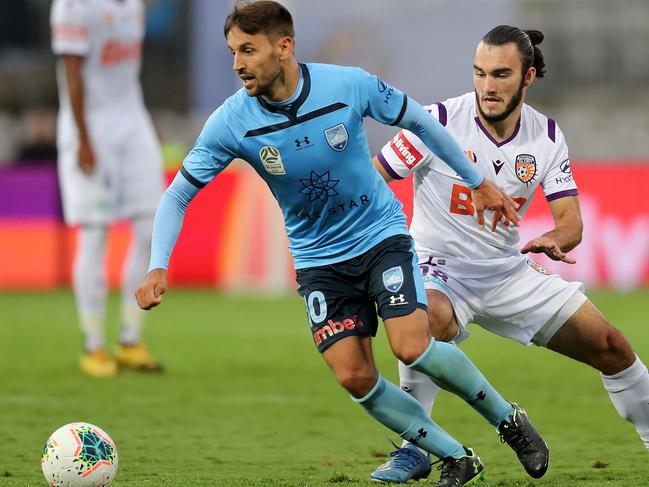 SYDNEY, AUSTRALIA - MARCH 14: Milos Ninkovic of Sydney FC and Nicholas Dagostino of Perth Glory during the round 23 A-League match between Sydney FC and the Perth Glory at Netstrata Jubilee Stadium on March 14, 2020 in Sydney, Australia. (Photo by Scott Gardiner/Getty Images)