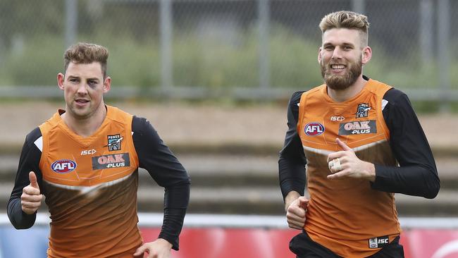 Brett Eddy and Jackson Trengove at Port Adelaide training this week. Bone believes Trengove has to play. Picture: Sarah Reed