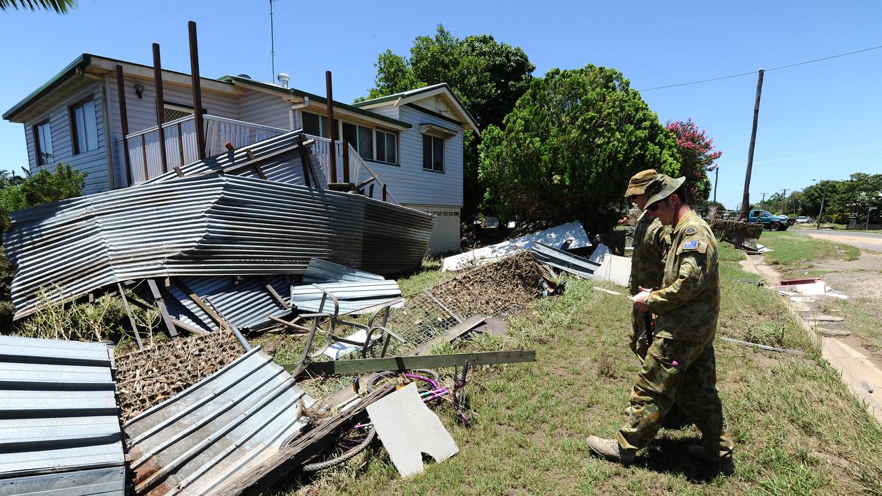 The Army inspects flood damage in North Bundaberg, Saturday, Feb. 2, 2013. Residents of the hardest hit suburb in Queensland's flood crisis have begun the heartbreaking journey of returning home to assess damage after police opened the Burnett Bridge to north Bundaberg residents at 6am. (AAP Image/Paul Beutel) NO ARCHIVING