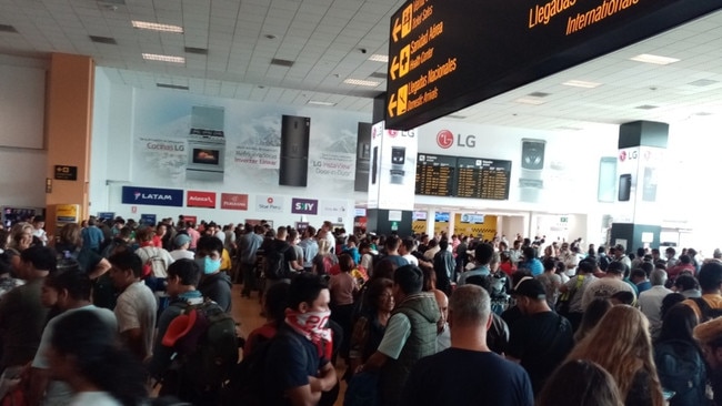 Tourists trapped at Jorge Chavez International Airport in Lima, Peru.