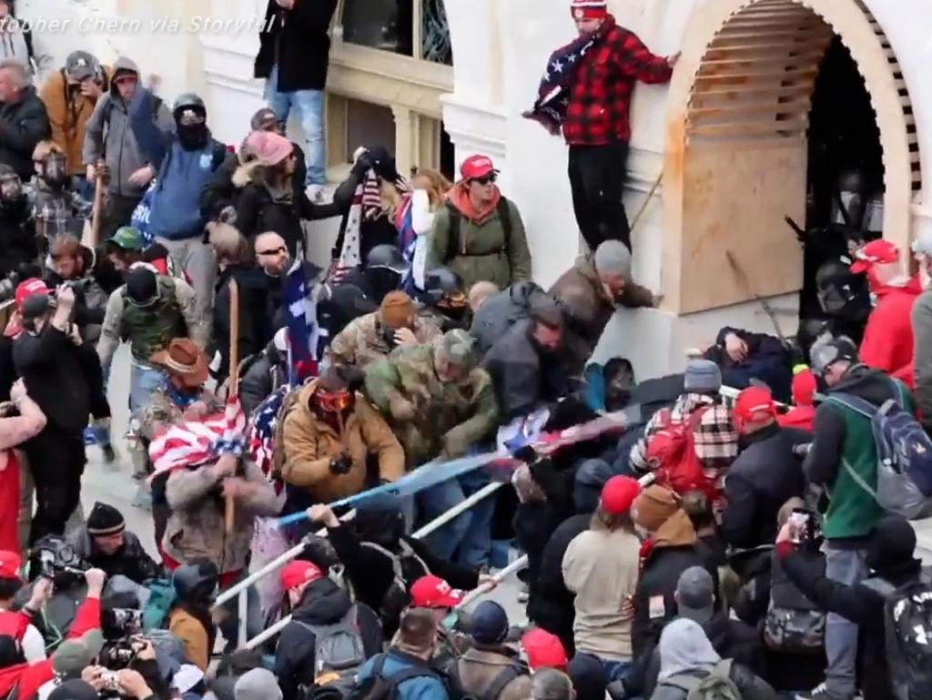 Police officer attacked by angry mob during Capitol building riots. Picture: Storyful