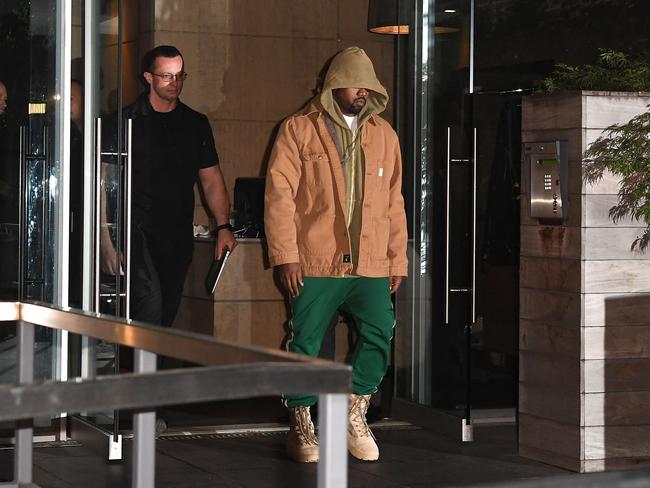 Kanye West leaves his New York apartment where he has been staying with wife Kim Kardashian after she was robbed in Paris. Picture: AFP/Angela Weiss