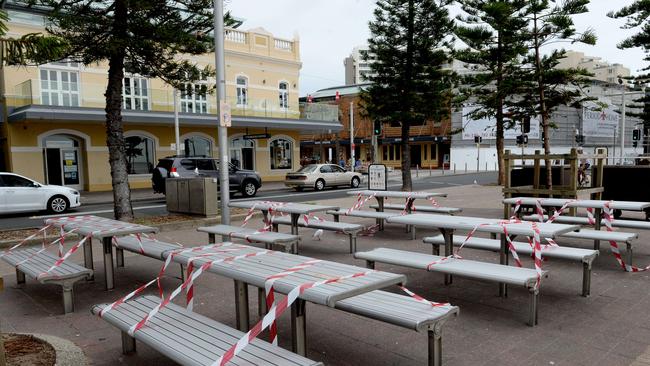 Sitting areas are roped off along Manly beaches as part of social distancing rules. Picture: Jeremy Piper