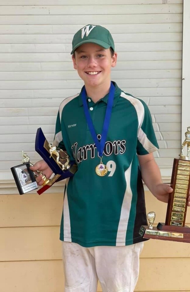 Thomas Howard posing after winning TSA's Junior male with Most Potential award for the 2020/21 season. Picture – Facebook/Warriors Softball Club.