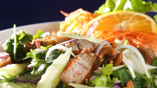 FAITHFUL FOLLOWING: Crisp pork belly and cashew salad at Poemphun Thai Restaurant in Sheridan St.