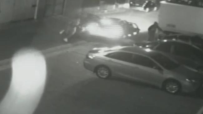 Three men are then seen running from the car.