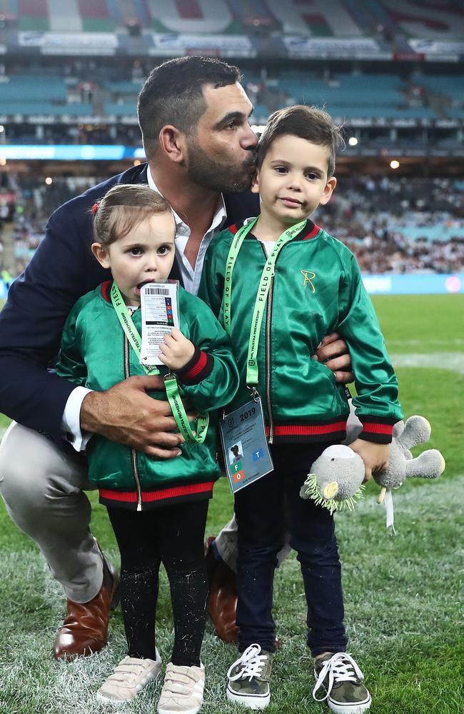 Greg Inglis with daughter Quinn and son Nate at his NRL farewell at ANZ Stadium. Picture. Phil Hillyard