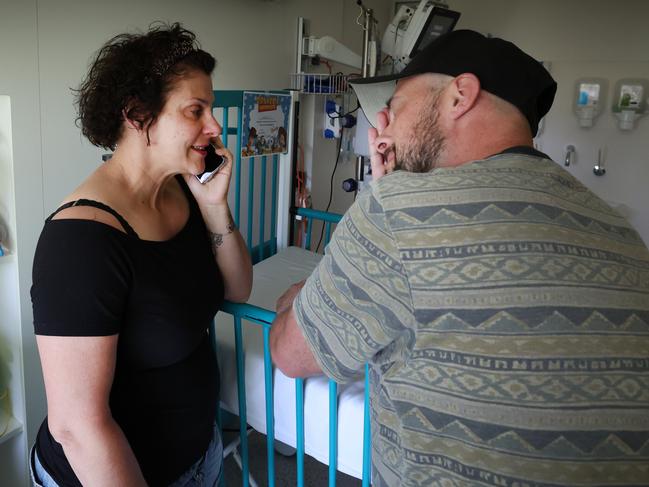 Parents Kristy and Matt Busuttil get the call from the surgical team the transplant will be going ahead in the afternoon. Picture: David Caird