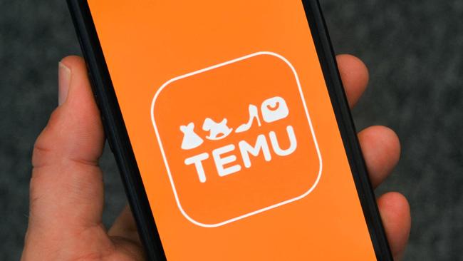 This photograph shows the logo of Chinese e-commerce company Temu displayed on a mobile phone, in Brussels, on November 4, 2024. (Photo by Nicolas TUCAT / AFP)