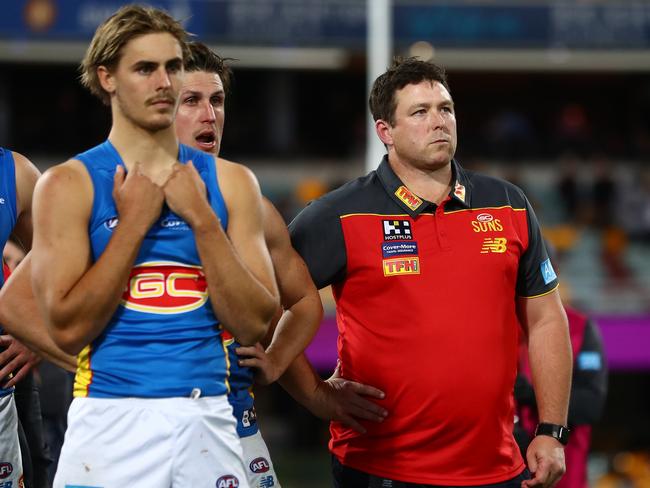 Suns coach Stuart Dew looks on after the round 19 AFL match between the Brisbane Lions and the Gold Coast Suns at The Gabba on July 23, 2022 in Brisbane, Australia. (Photo by Chris Hyde/AFL Photos/Getty Images)