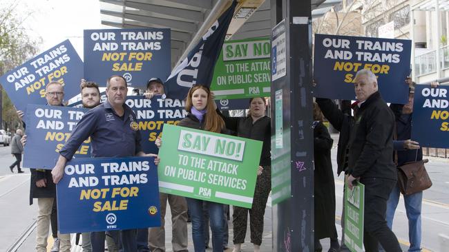 RTB Union members protest at the North Terrace tram stop over privatisation of the trams. Picture: Emma Brasier