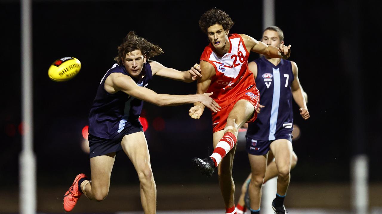 Max Ramsden gets a kick away. Picture: Mike Owen/AFL Photos/via Getty Images