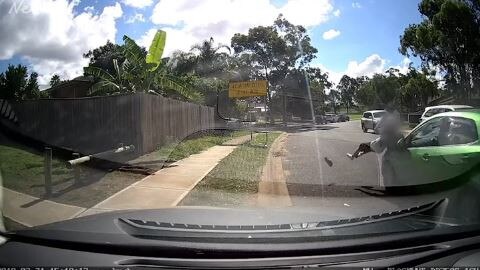 Moment of impact as boy bounces off car