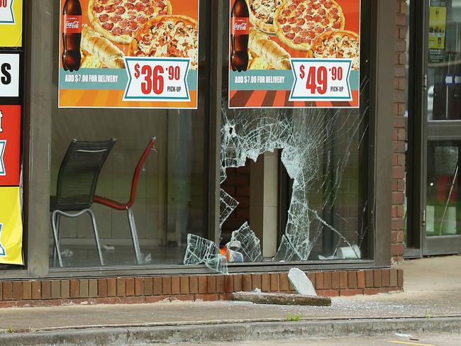 Police on scene at Corangamite Drive, Corio, where a man was critically injured at a takeaway store. Picture: Alison Wynd