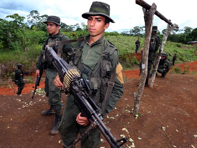 Columbian Police National Narcotics personnel in Tumaco during an eradication cocaine plantation operation. Picture Gary Ramage