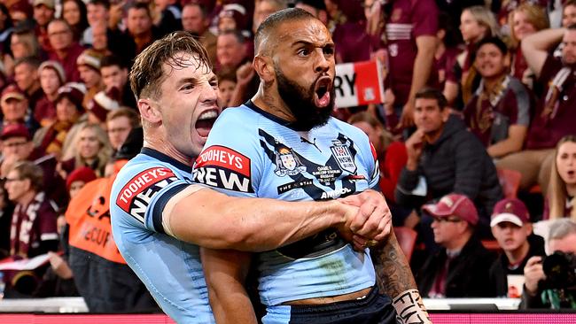 BRISBANE, AUSTRALIA - JUNE 27: Josh Addo-Carr of the Blues celebrates with team mate Cameron Murray after scoring a try during game two of the 2021 State of Origin series between the Queensland Maroons and the New South Wales Blues at Suncorp Stadium on June 27, 2021 in Brisbane, Australia. (Photo by Bradley Kanaris/Getty Images)