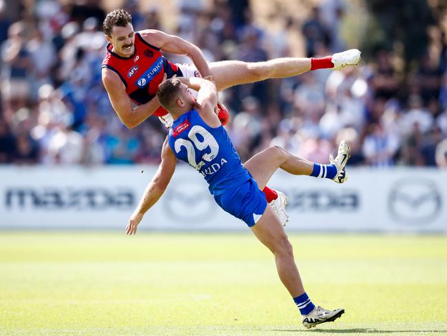 Jake Lever and Will Phillips collide. Picture: Dylan Burns/AFL Photos